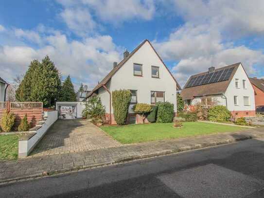 Charmantes Einfamilienhaus mit großem Garten und Garage
in bevorzugter Wohnlage von Herrenshoff