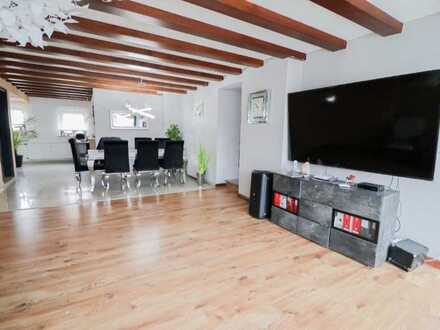 Traumhafte Terrassenwohnung mit großem Garten und Sonnenterrasse