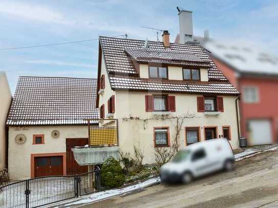 Sanierungsbedürftiges Einfamilienhaus mit großer Scheune