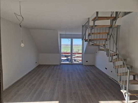 Erstbezug der stilvollen 4-Zimmer-Maisonette-Wohnung mit gehobener Innenausstattung mit Balkon