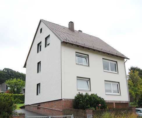 Einzelhaus mit 3 WE und 2 Garagenstellplätzen in landschaftlich schöner Lage