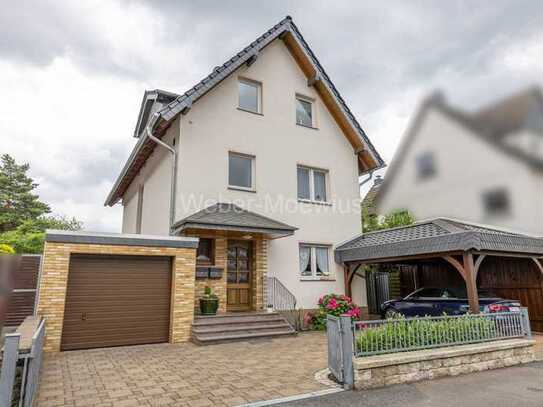 **Ein Haus mit Charme** und mit wunderschönem Garten in attraktiver Lage von Bergisch Gladbach