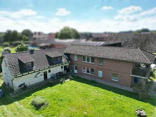 Großzügiges Mehrfamilienhaus mit 4 Wohnungen, Garage und Scheune als Kapitalanlage