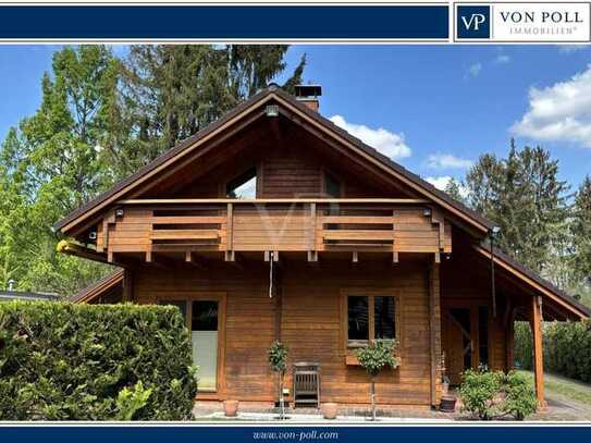 Idyllischer und individuell Leben - hochwertiges Blockbohlenhaus mit luxuriösem Wintergarten