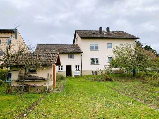 Großes Potenzial - Mehrfamilienhaus mit Baugrundstück in Freiburg-Tiengen