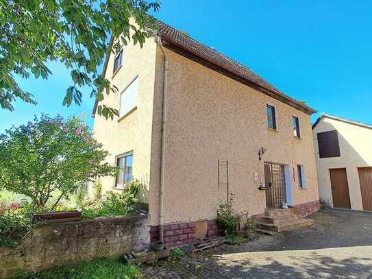 Einfamilienhaus mit Erweiterungspotenzial: Viel Platz, sonniger Garten und naturnahe Lage