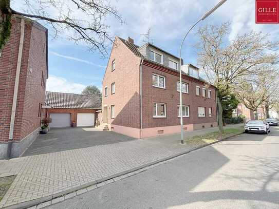 Gepflegtes Dreifamilienhaus mit Garten und Garage in Neuss-Holzheim