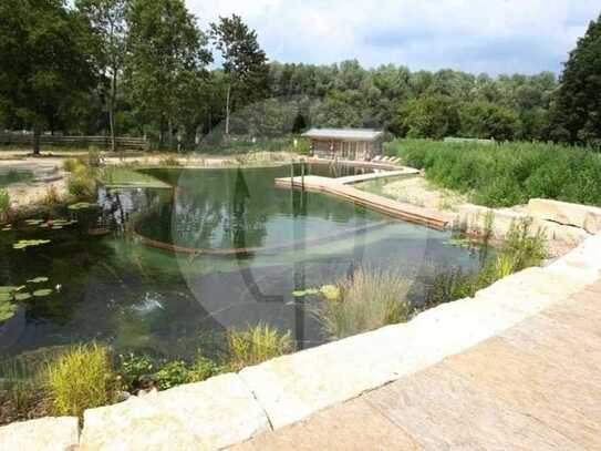 Baugrundstück mit 450 m² Naturschwimmteich und Blockhaussauna