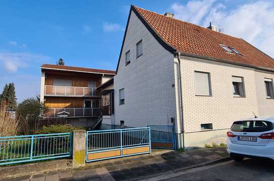 Sanieren oder neu bauen: Doppelaushälfte mit Anbau in ruhiger Wohnlage in Landau-Horst