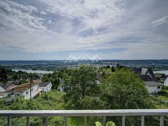 Investitionsgelegenheit mit Rheinblick: Mehrfamilienhaus mit 4 Wohneinheiten und Garagengebäude