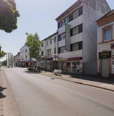 Jetzt neu! Renovierungsbedürftiges Wohn-Geschäftshaus in Troisdorf