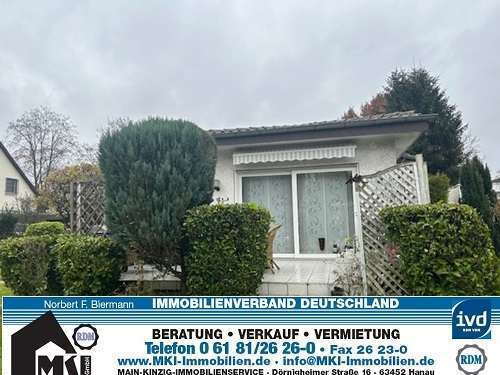 2-Zimmer Wohnung im Bungalowstil mit Terrasse und Gartenanteil