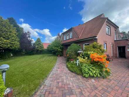 Wohnen mit Stil im Herzen von Ostfriesland? In einem malerischen Einfamilienhaus, das viel Geborgenh