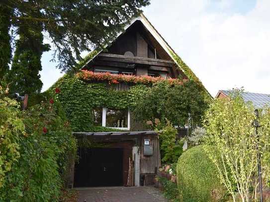 Einfamilienhaus mit Teilkeller und Garage