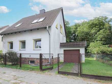 Wohnen mit Grün: Schönes Zuhause mit Garten und Garage in Berlin-Wittenau