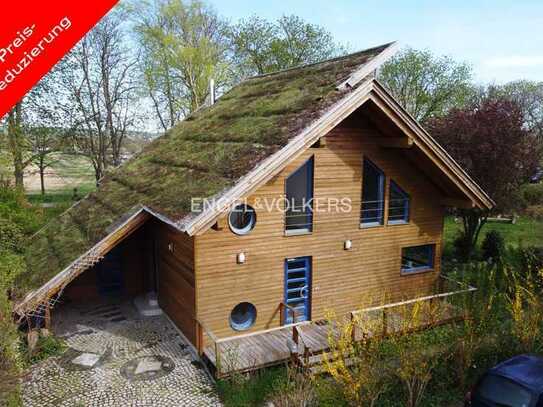 Nachhaltiges Wohnglück – Freistehendes Einfamilienhaus mit ökologischer Holzständerbauweise für N...