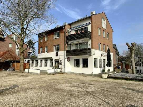 Mehrfamilienhaus mit Gastronomie in Meerbusch-Büderich