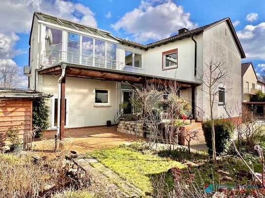 Einfamilienhaus mit Anbau, Terrasse und Garten mit viel Gestaltungspotenzial