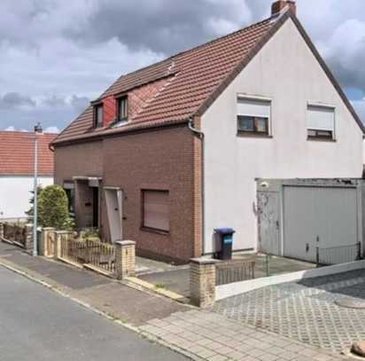 FESTPREIS: DHH links mit viel Potential und Garage in guter Lage von Bremen-Vegesack (OT Grohn)