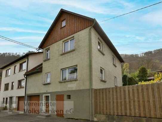 Freistehendes Einfamilienhaus (DHH) mit Garten und Garage