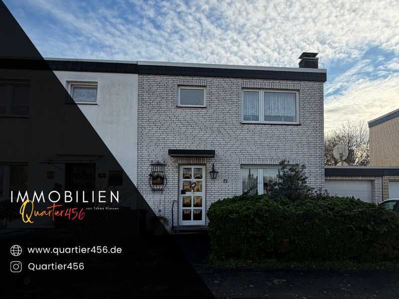 Charmante Doppelhaushälfte mit Südost-Garten – Wohnen nahe am Rhein