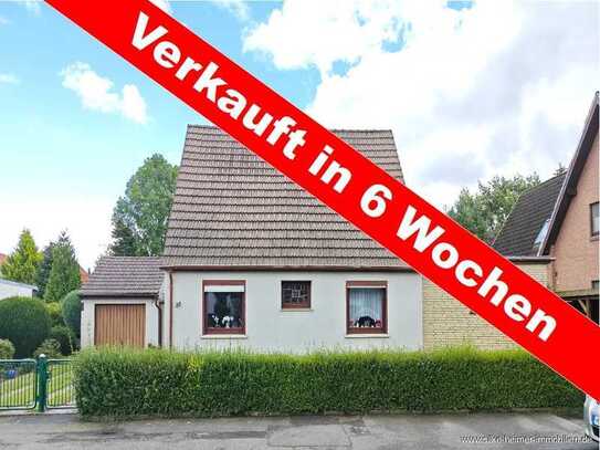 ** Solides Einfamilienhaus mit Garage auf traumhaftem Grundstück **