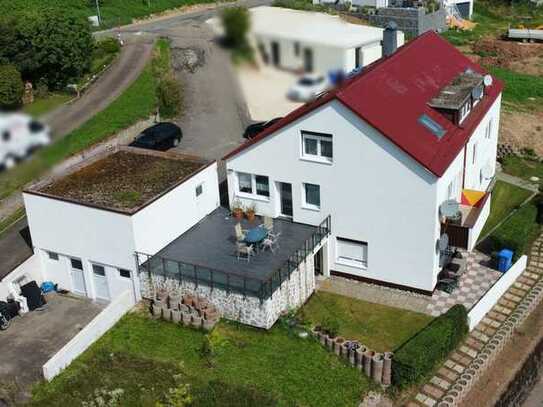 Einzigartiges Mehrfamilienhaus in Südhanglage