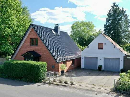 Einladendes Einfamilienhaus mit Doppelgarage in Bremen-Lesum.