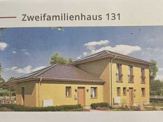 Zweifamilienhaus mal anderst! Kombination aus Toscana Haus und Bungalow in Massivbauweise!