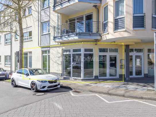 Modernes Ladenlokal mit 2 straßenseitigen Eingängen in gut sichtbarer Lage / 2 TG-Stellplätze