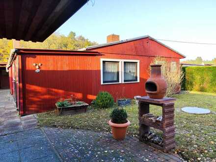 Bungalow mit Kaminofen und Carport