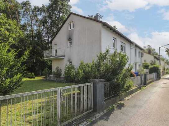 Selbst wohnen oder vermieten: teilweise modernisierte DHH mit großem Garten in Nürnberg-Reichelsdorf