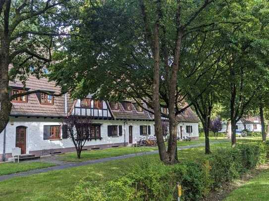 Feine Wohnung im Erdgeschoss mit Terrasse