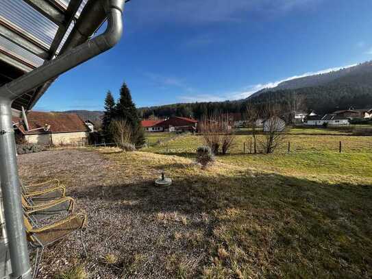 Bungalow mit zwei Wohnungen in bester Wohnlage