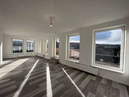 Moderne 2 1/2 Zimmerwohnung mit beeindruckender Dachterrasse!