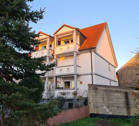 Minfeld: freundlich helle EG-Wohnung mit Süd/West-Balkon, Stellplatz und kleinem Garten