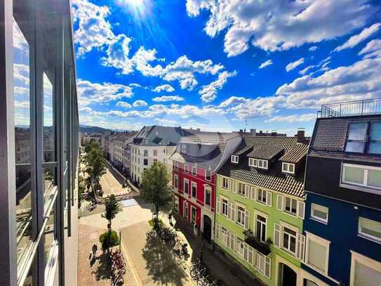 Panoramablick im Herzen Freiburgs – barrierefreie Großraumbüros