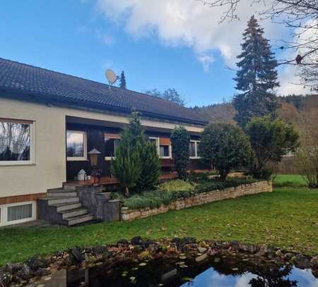 Einfamilienhaus mit idyllischem Gartenteich und Erweiterungspotenzial