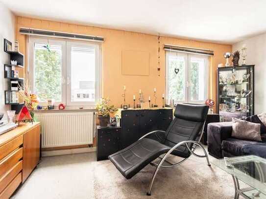 Strahlende Erdgeschosswohnung mit sonnigem Süd-Balkon und privater Garage