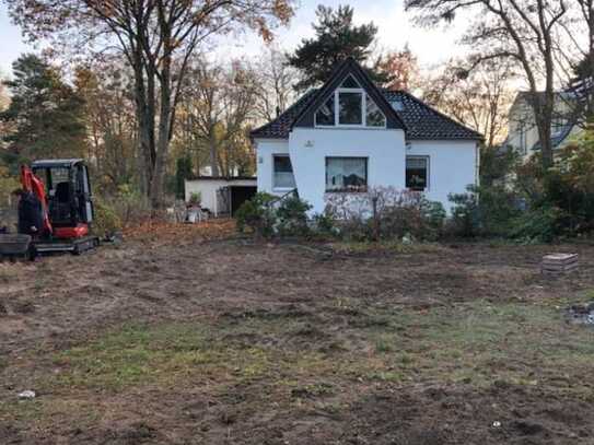 IMMOBERLIN.DE - Kleines Haus auf großem Grundstück in vorzüglicher Wohnlage