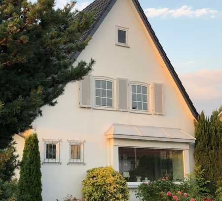 Charmantes Einfamilienhaus mit Wintergarten und gepflegtem Garten in zentraler Lage von Lengerich