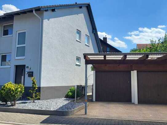 RESERVIERT! Modernisierte Doppelhaushälfte mit 2 Garagen und ELW in Nierstein