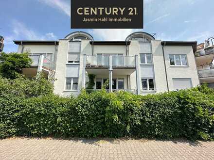 Helle Maisonette-Wohnung mit Dachterrasse in begehrter Lage!