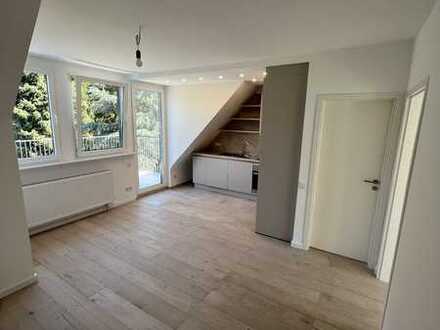 Geschmackvolle kernsanierte Maisonette-Wohnung mit Luxus-EBK in Düsseldorf