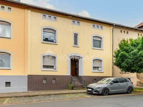 Charmantes Mehrfamilienhaus mit Terrasse und Garage