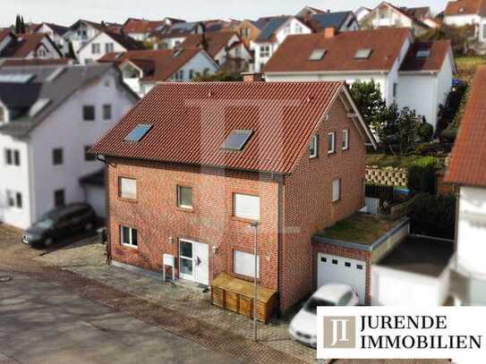 Attraktive Kapitalanlage in Feldrandlage – Gepflegtes Zweifamilienhaus mit Einliegerwohnung