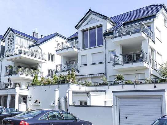 Lichtdurchflutete Maisonettewohnung mit großer Dachterrasse