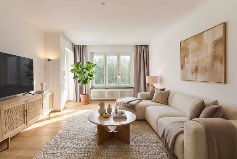 Stil und Charme: Reizendes Stadtdomizil mit Balkon in feinster Bogenhauser Lage