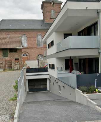 Tiefgaragenstellplatz (kein Duplex) in Neubau zu vermieten