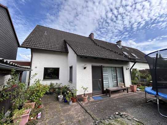 Wohlfühl-Einfamilienhaus mit Garten und Garage!